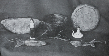 タツ子人形と国鱒意匠陶器の写真